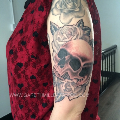 black and grey tattoo skull roses soft shading realism tattoo leeds