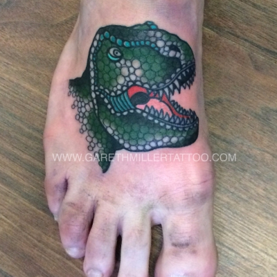 dinosaur t-rex trad old school tattoo leeds