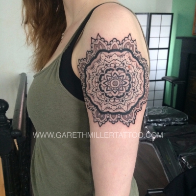 geometric mandala on arm dotwork tattoo leeds