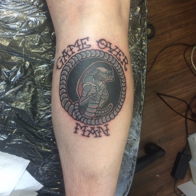 game over giger alien movie tattoo sleeve flash trad old school tattoo leeds