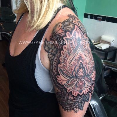 geometric henna sleeve flower mandala on arm dotwork tattoo leeds