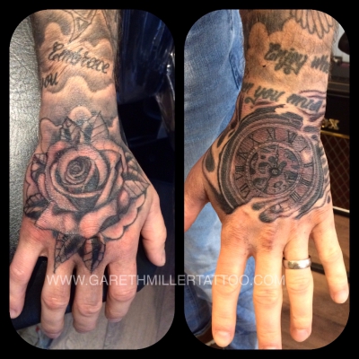 black and grey rose and pocket watch on hand tattoo soft shading realism tattoo leeds