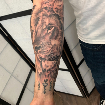lion black and grey tattoo leeds