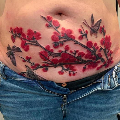 blossom brushstroke stomach tattoo leeds
